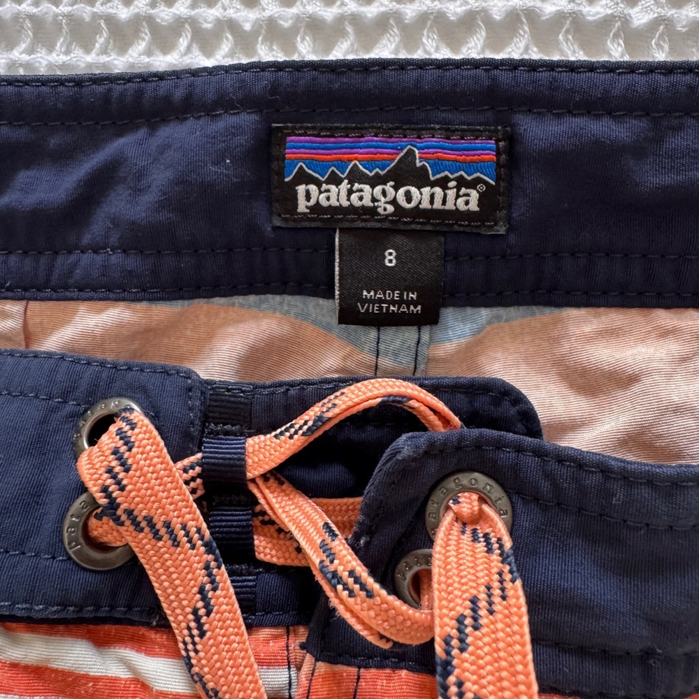 Patagonia boys board short 
 Striped Swim Shorts - Orange and Blue - Picture 2 of 3